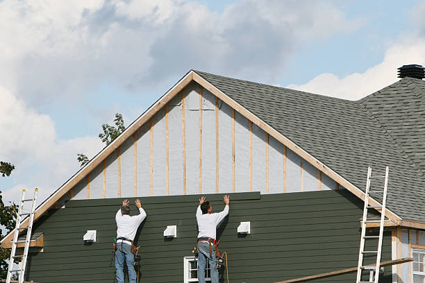 Professional Storm Damage Siding Repair technician working in Morgan, GA